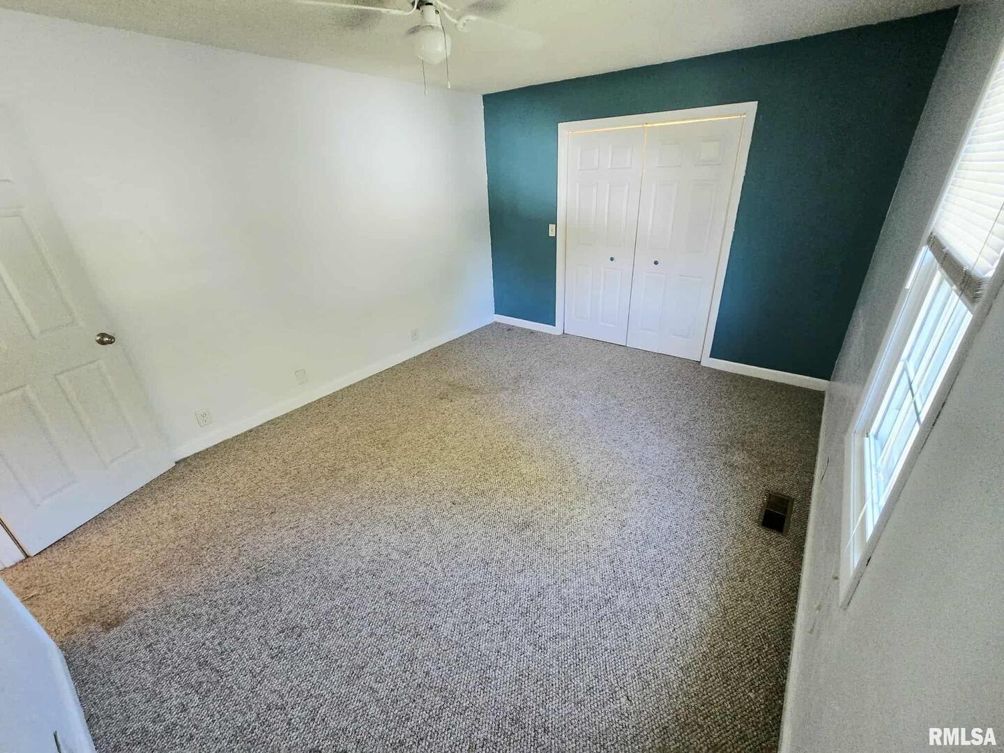 108 Mockingbird Lane Woodlawn, IL 62898 - Photo 54 of 59 an empty room with a hallway