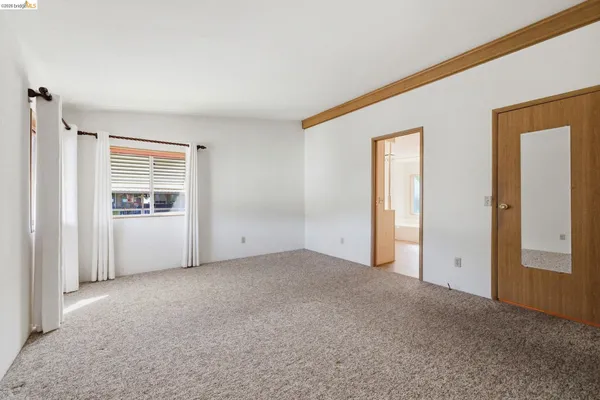 an empty room with window