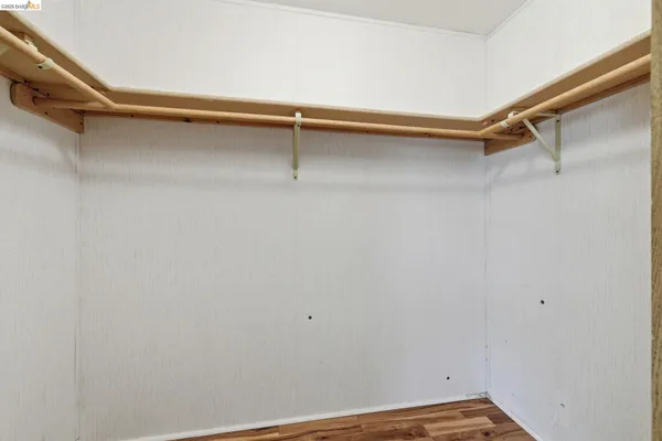 a view of a room with racks on the wall