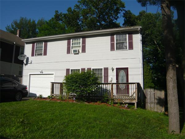23 Ambrose Street Springfield, MA 01109 - Photo 2 of 15 a view of backyard with barbeque grill and plants