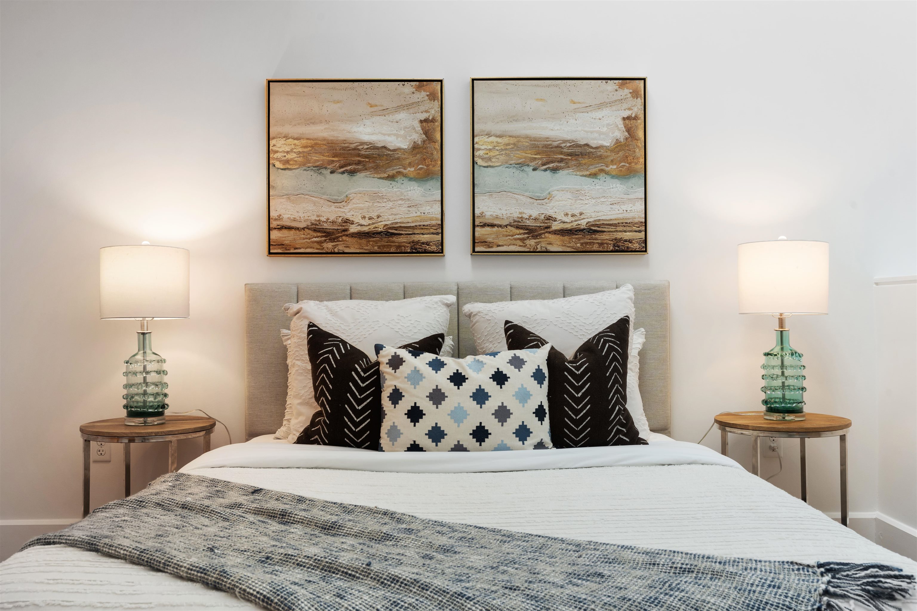 50 Dey Street, Unit 663 Jersey City, NJ 07306 - Photo 26 of 37 a bedroom with a bed and a lamp on dresser