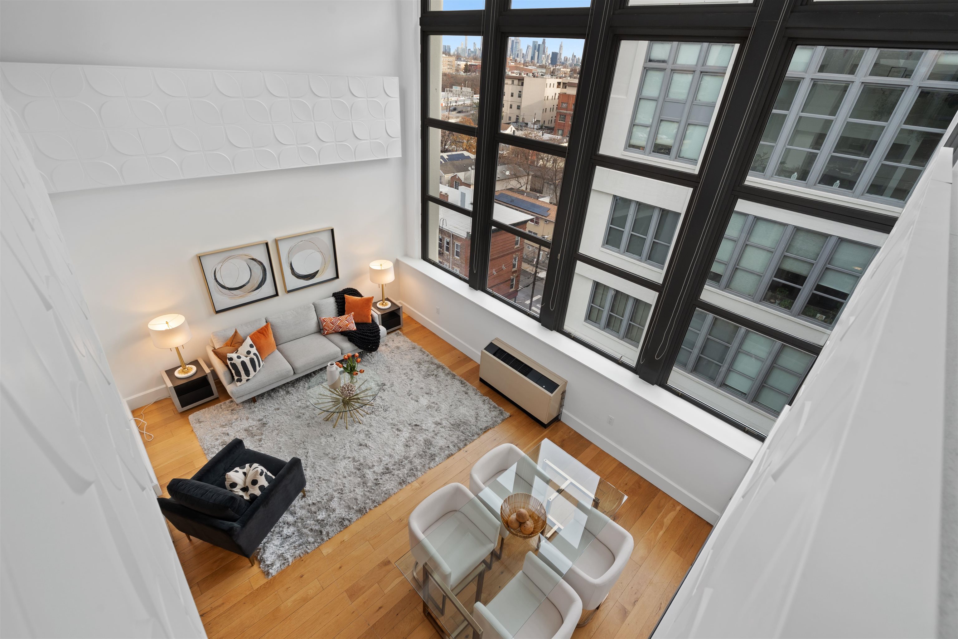 50 Dey Street, Unit 663 Jersey City, NJ 07306 - Photo 29 of 37 a living room with furniture and a window