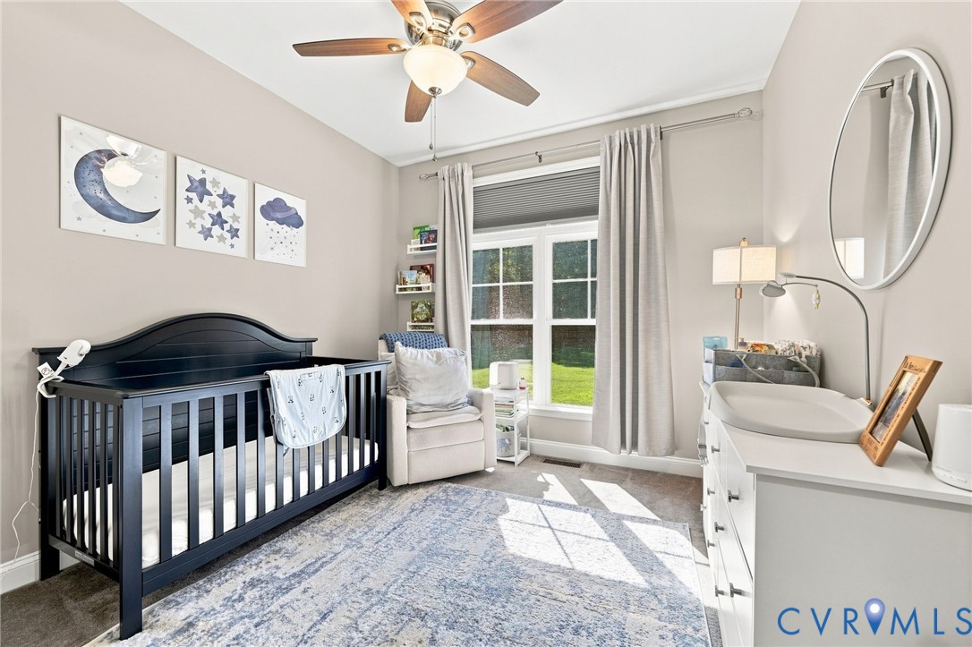 11318 River Road Chesterfield, VA 23838 - Photo 18 of 29 Neutral paint tones, crown molding, and a ceiling