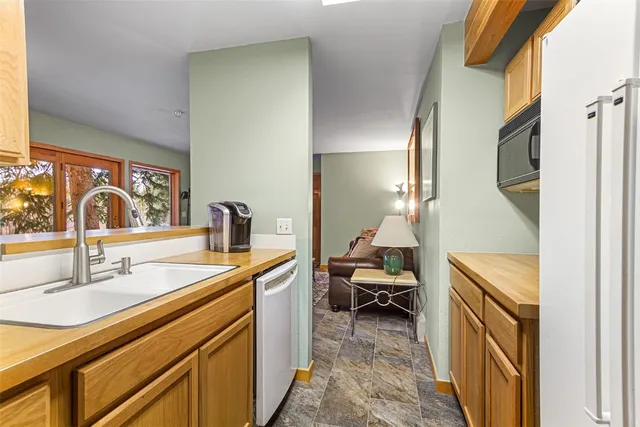a en suite bathroom with a sink and a mirror