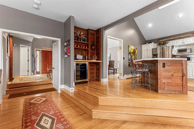 a lobby with furniture and rug