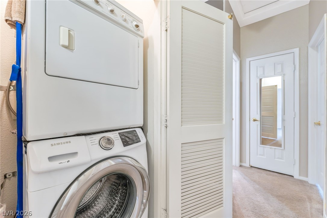 6317 Snap Ridge Street, Unit 101 North Las Vegas, NV 89081 - Photo 22 of 40 Stacked washer and dryer.