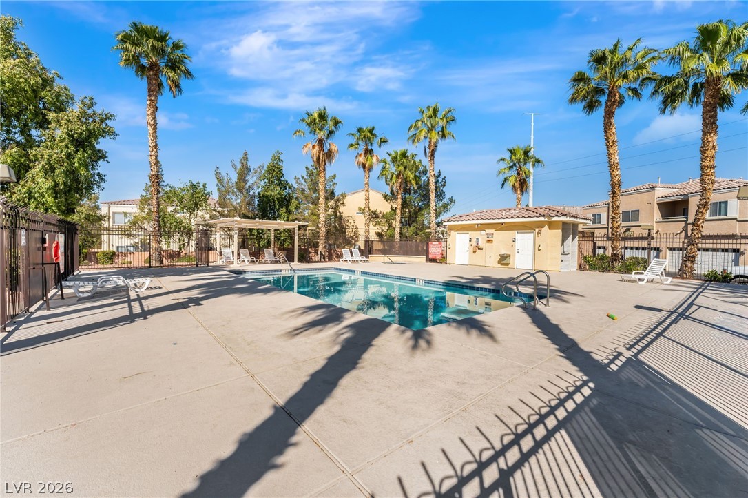 6317 Snap Ridge Street, Unit 101 North Las Vegas, NV 89081 - Photo 30 of 40 Community pool, spa, and restrooms.