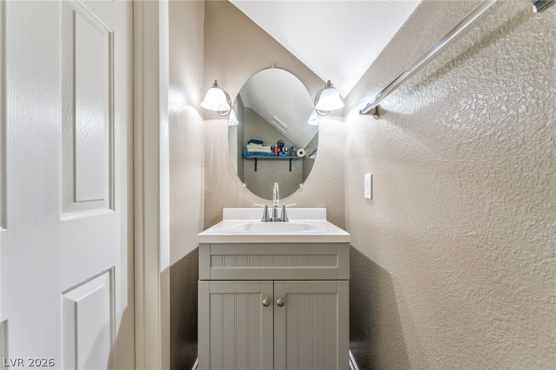 6317 Snap Ridge Street, Unit 101 North Las Vegas, NV 89081 - Photo 10 of 40 Downstairs 1/2 bathroom.