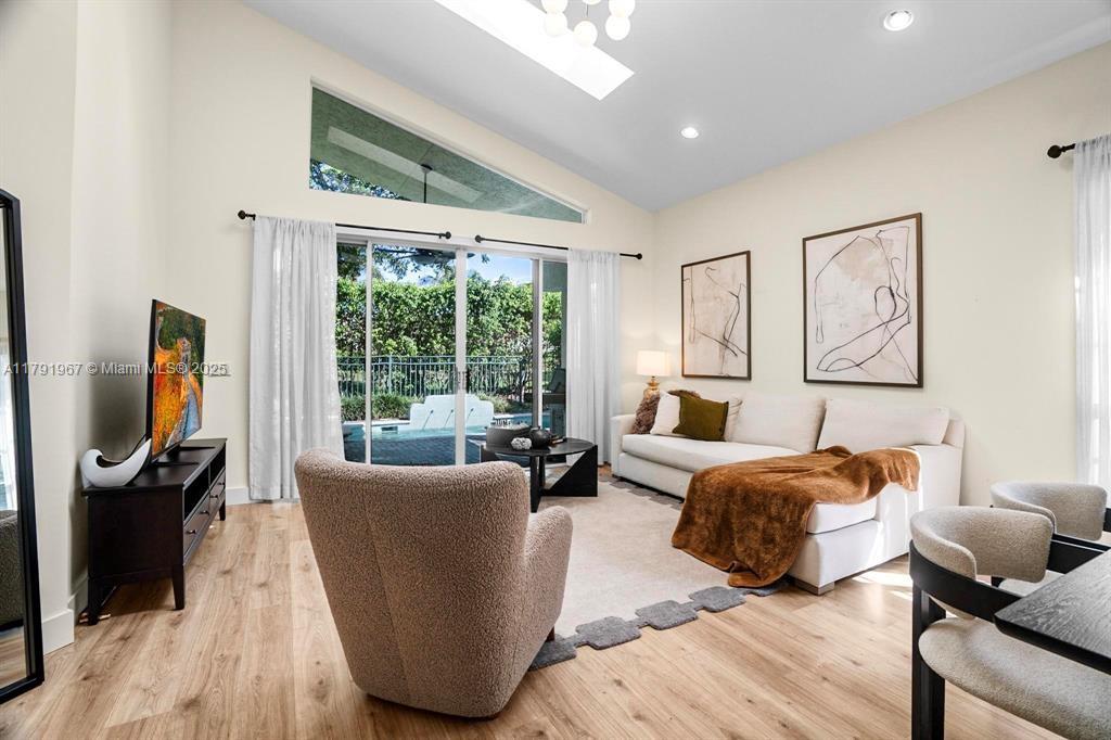 6375 Northwest 24th Street Boca Raton, FL 33434 - Photo 3 of 13 a bedroom with two beds and a large window