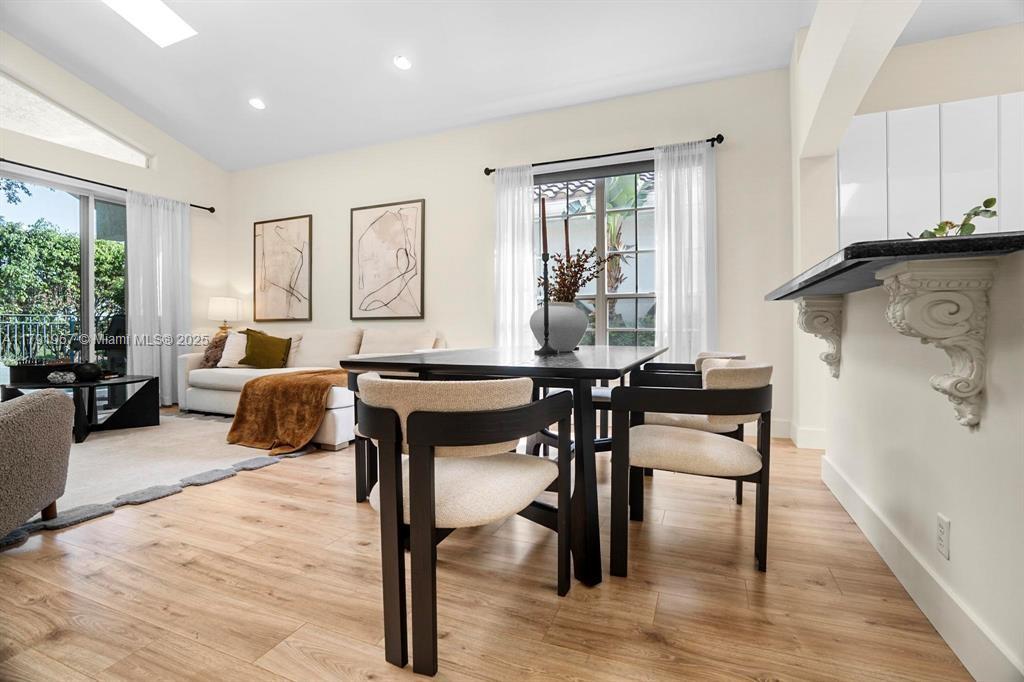 6375 Northwest 24th Street Boca Raton, FL 33434 - Photo 5 of 13 a living room with furniture and a wooden floor