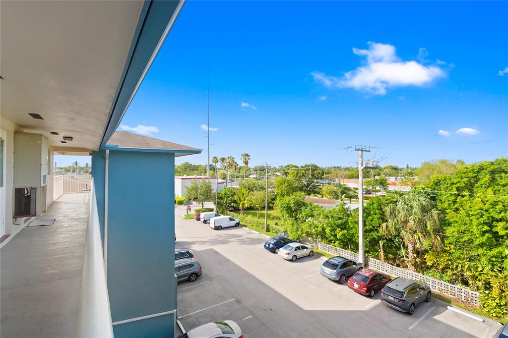5800 Margate Boulevard, Unit 3463 Margate, FL 33063 - Photo 31 of 37 a view of a balcony with many windows