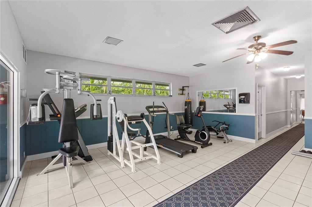 5800 Margate Boulevard, Unit 3463 Margate, FL 33063 - Photo 32 of 37 a view of a livingroom with furniture and a floor to ceiling window