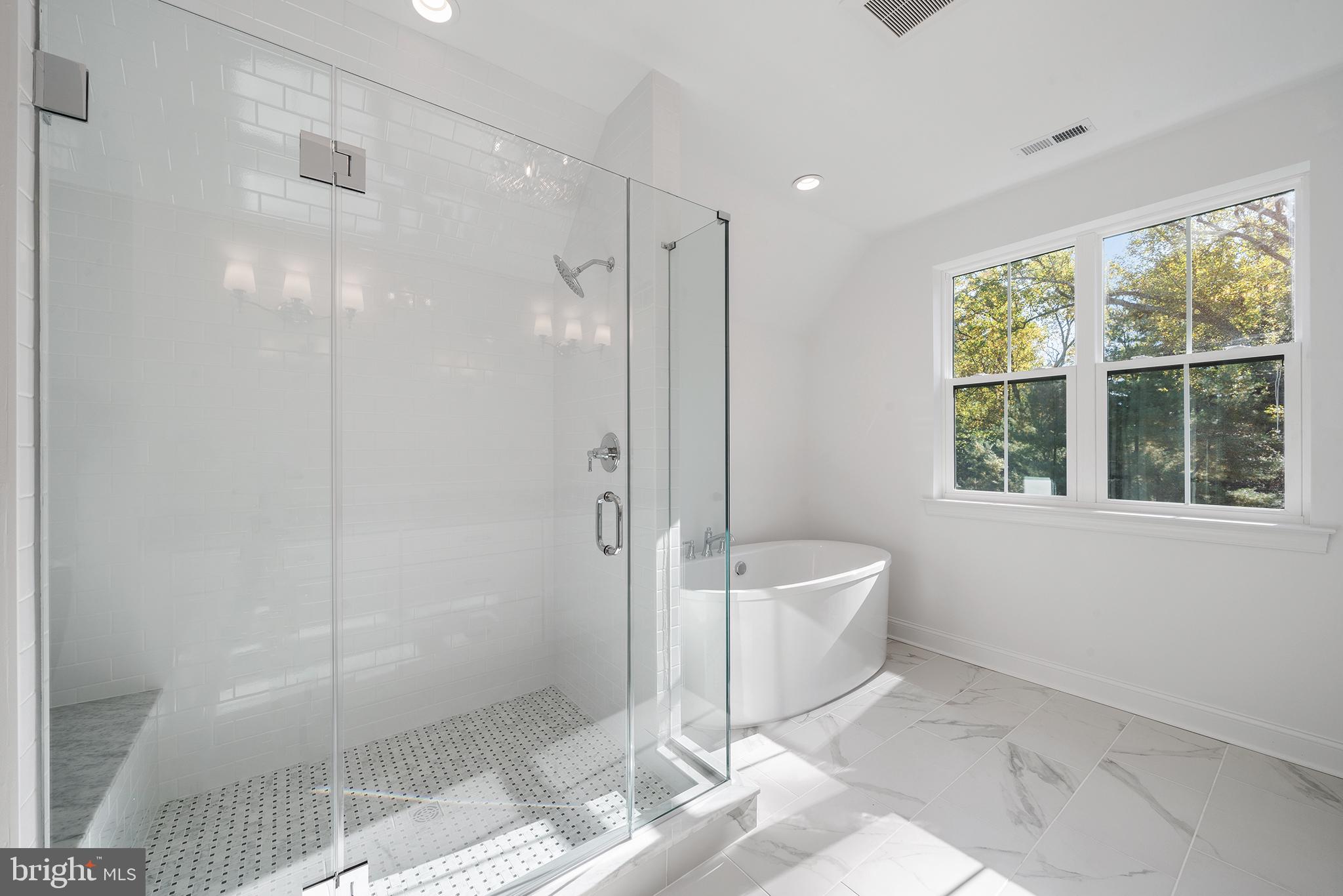 2 Valley Road Huntingdon Valley, PA 19006 - Photo 12 of 17 a spacious bathroom with a shower and a bathtub
