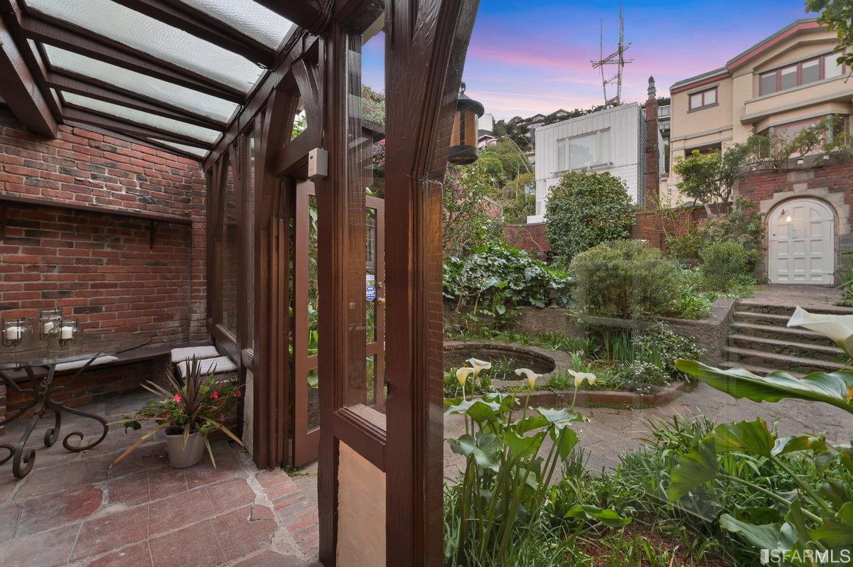 58 Graystone Terrace San Francisco, CA 94114 - Photo 27 of 88 a view of backyard with wheel chair and potted plants