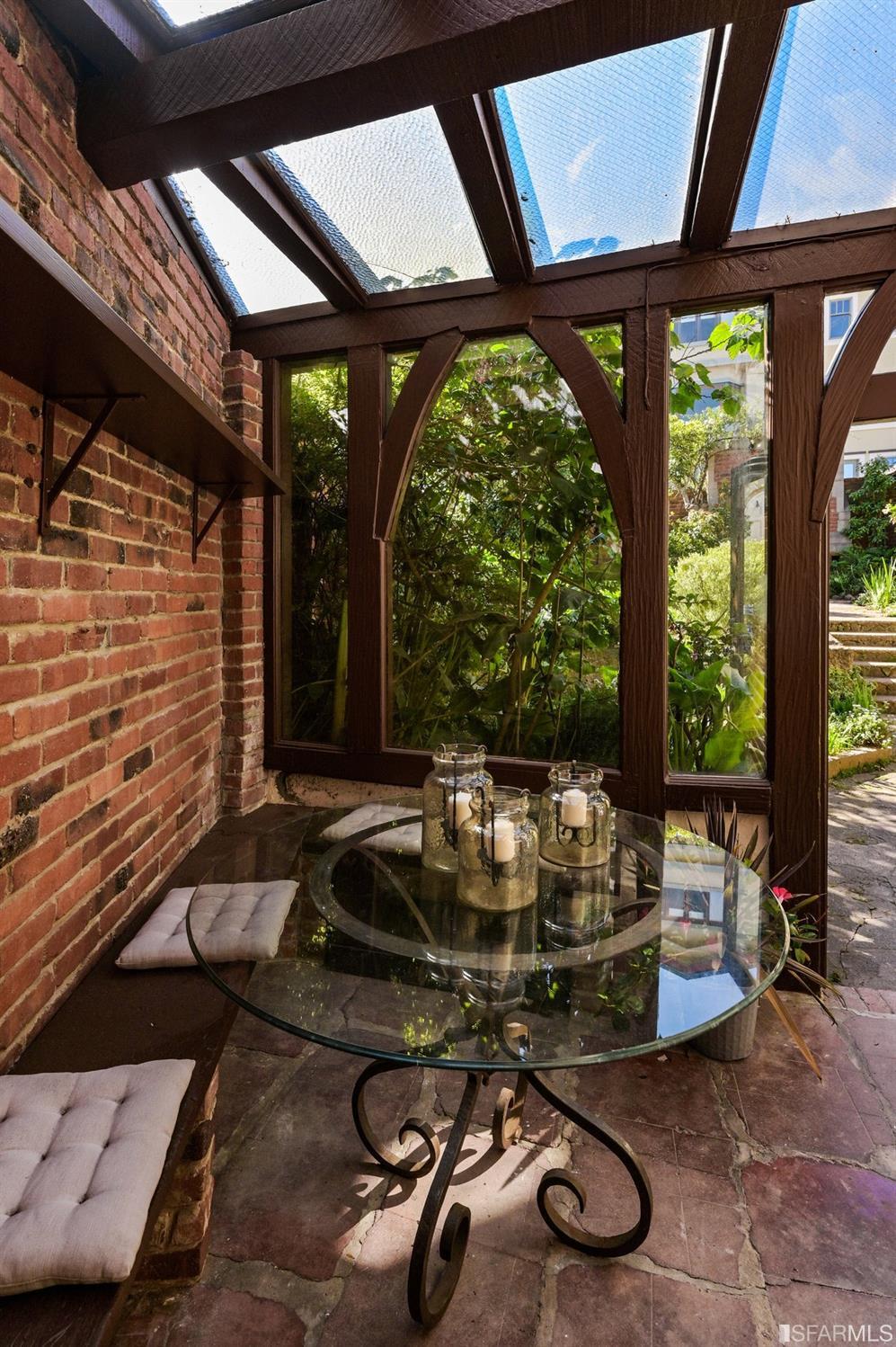 58 Graystone Terrace San Francisco, CA 94114 - Photo 29 of 88 a room with gym equipment and large windows