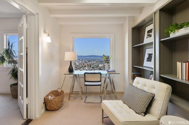 a view of a city with tall buildings