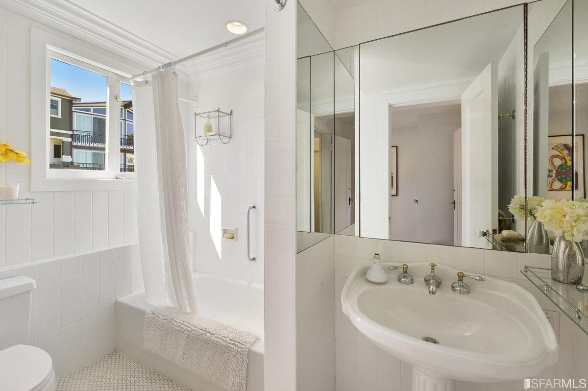 58 Graystone Terrace San Francisco, CA 94114 - Photo 57 of 88 a bathroom with a sink toilet and shower