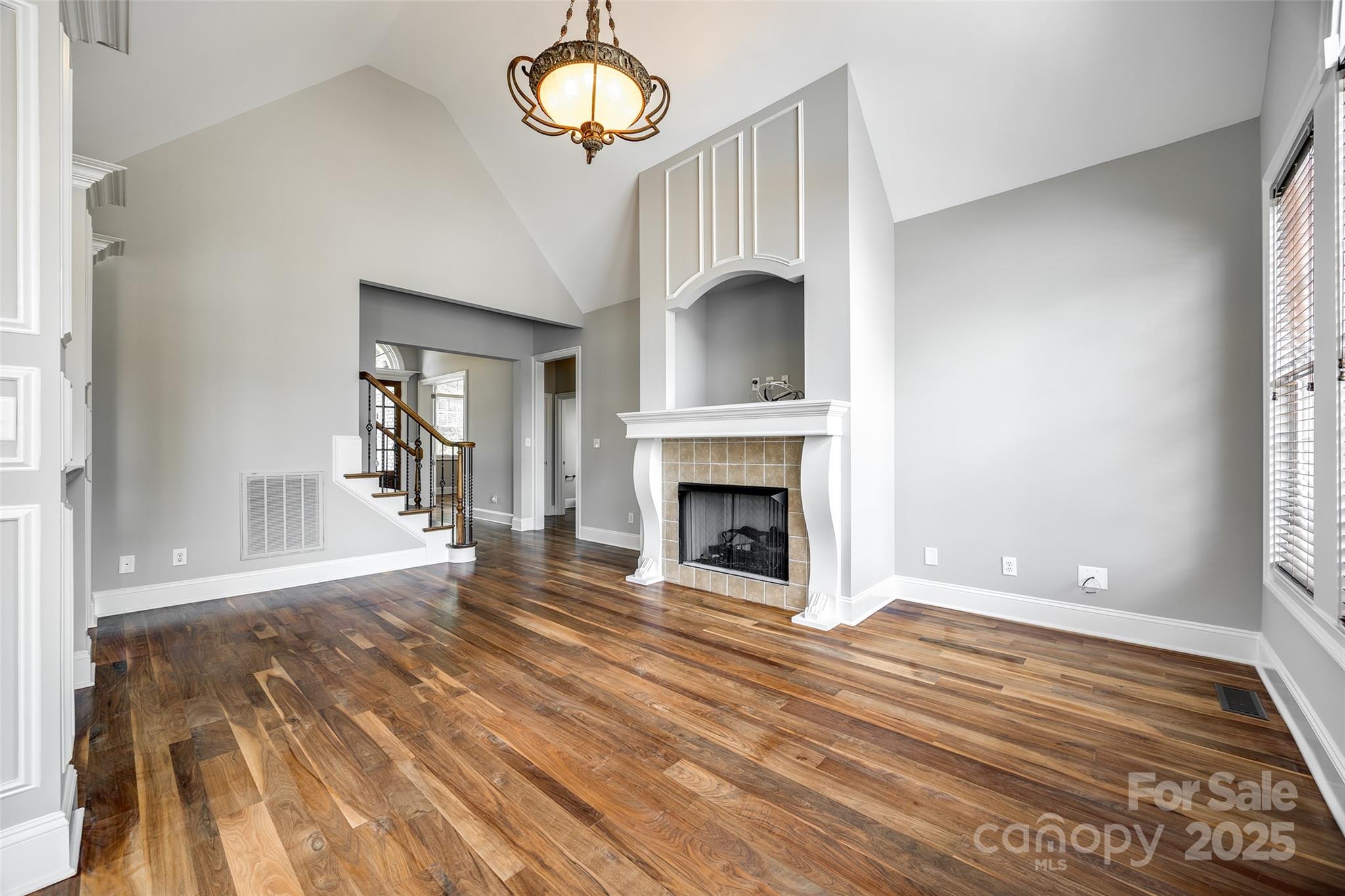 1765 Old Clay Hill Road York, SC 29745 - Photo 16 of 47 a view of empty room with wooden floor and fireplace