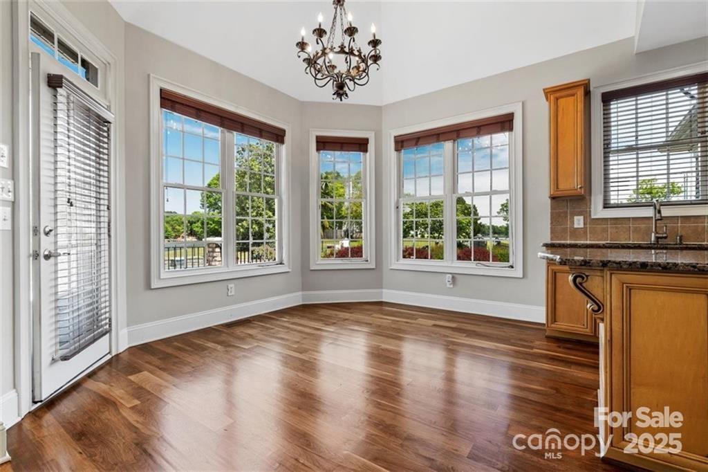 1765 Old Clay Hill Road York, SC 29745 - Photo 17 of 47 a view of an empty room with a window and wooden floor