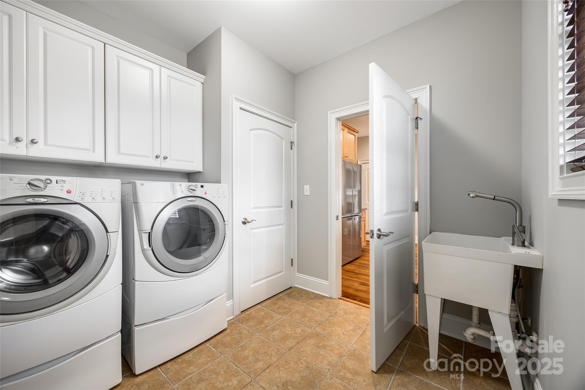 1765 Old Clay Hill Road York, SC 29745 - Photo 23 of 47 a view of a hallway with washer and dryer
