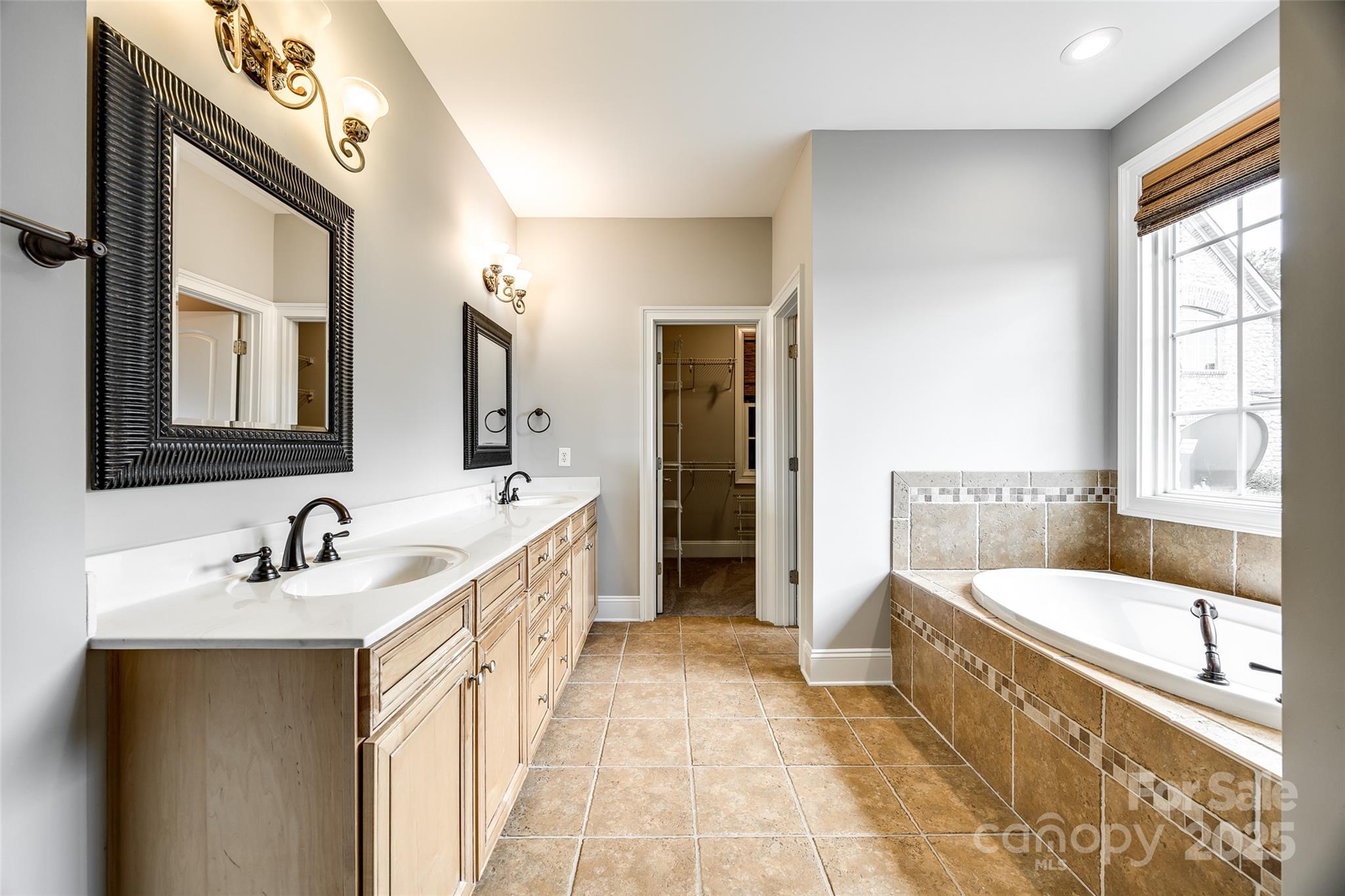 1765 Old Clay Hill Road York, SC 29745 - Photo 27 of 47 a bathroom with a bathtub sink and mirror