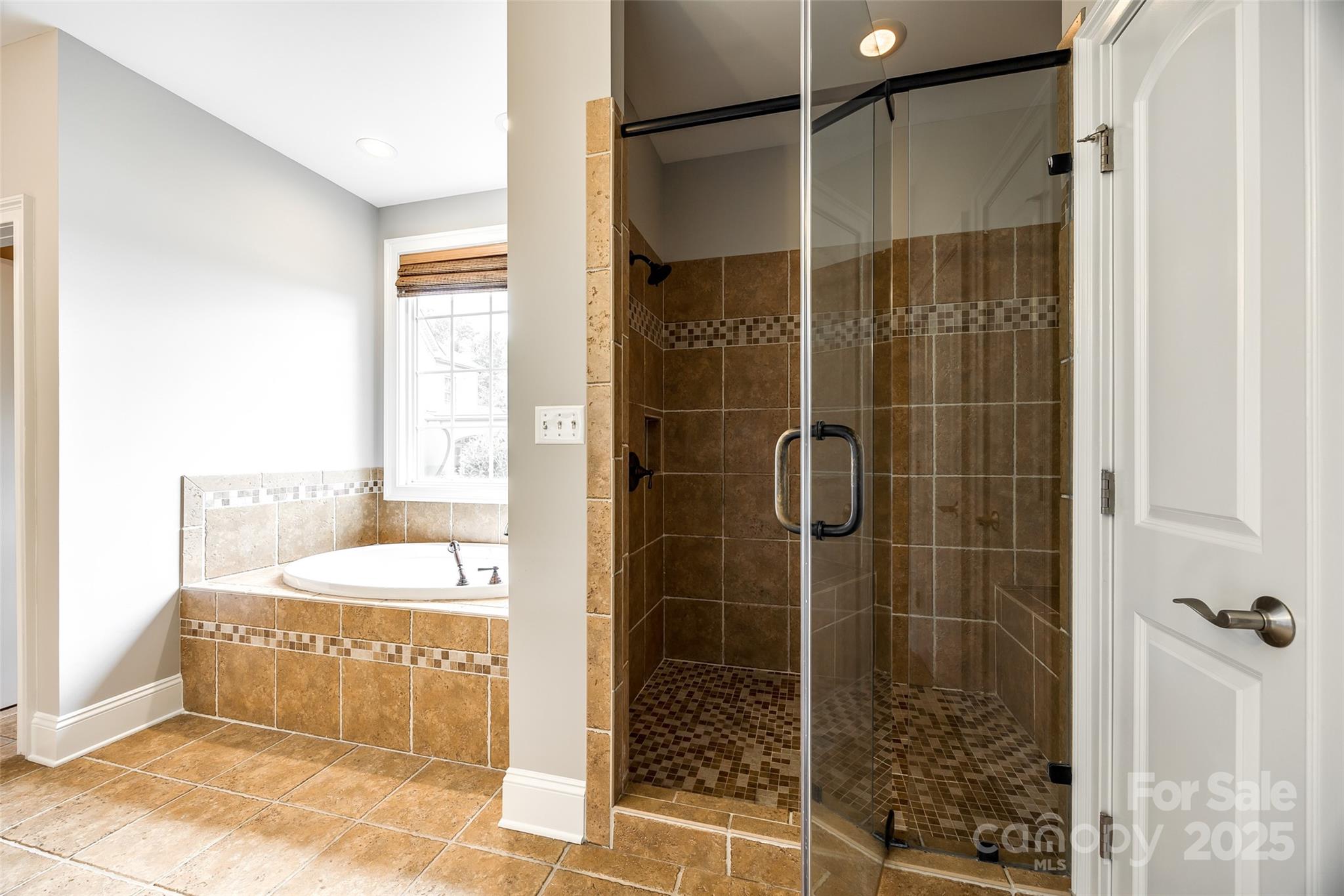 1765 Old Clay Hill Road York, SC 29745 - Photo 29 of 47 a bathroom with a tub and shower