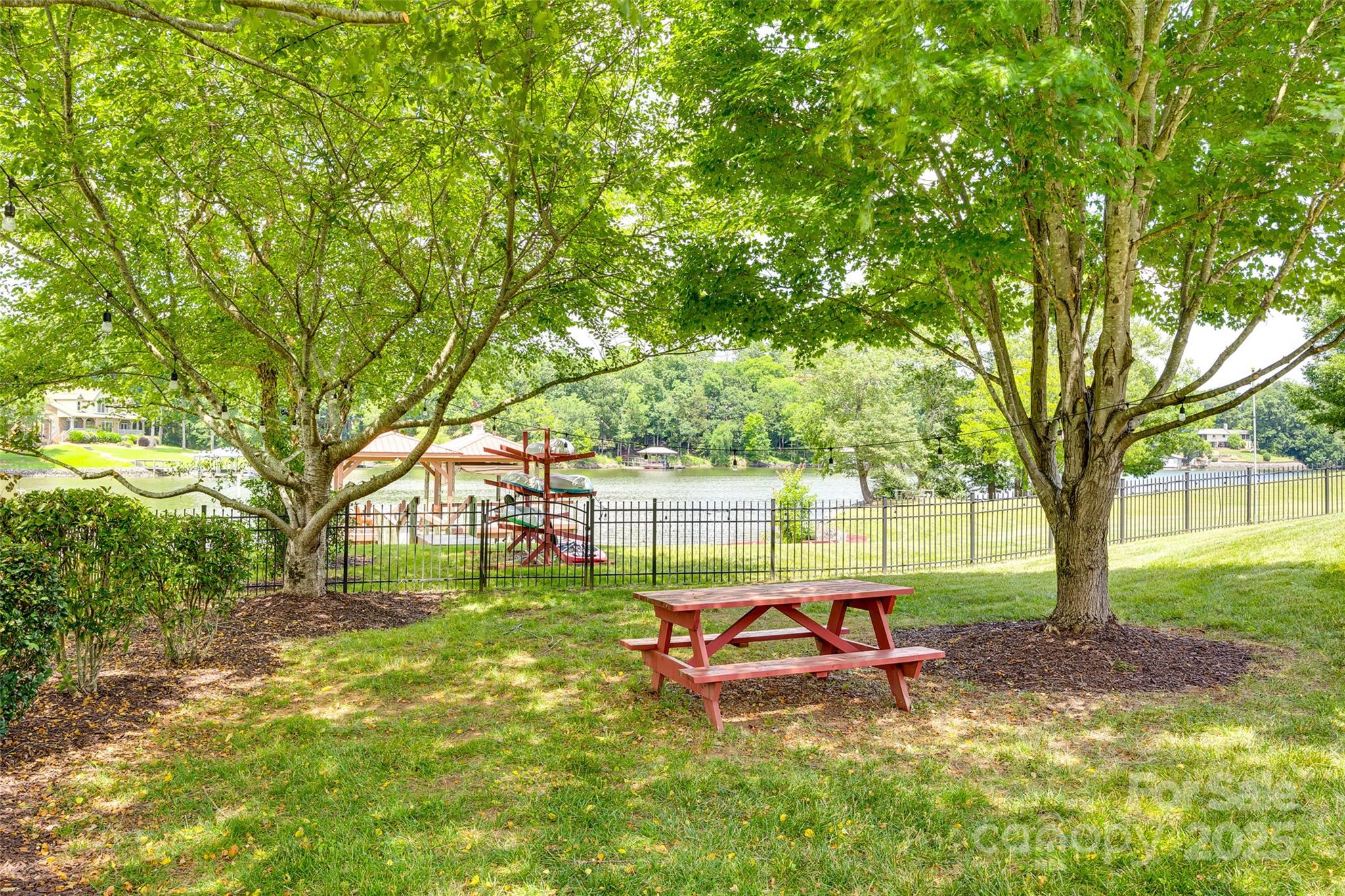 1765 Old Clay Hill Road York, SC 29745 - Photo 39 of 47 a view of a backyard with a garden and trees