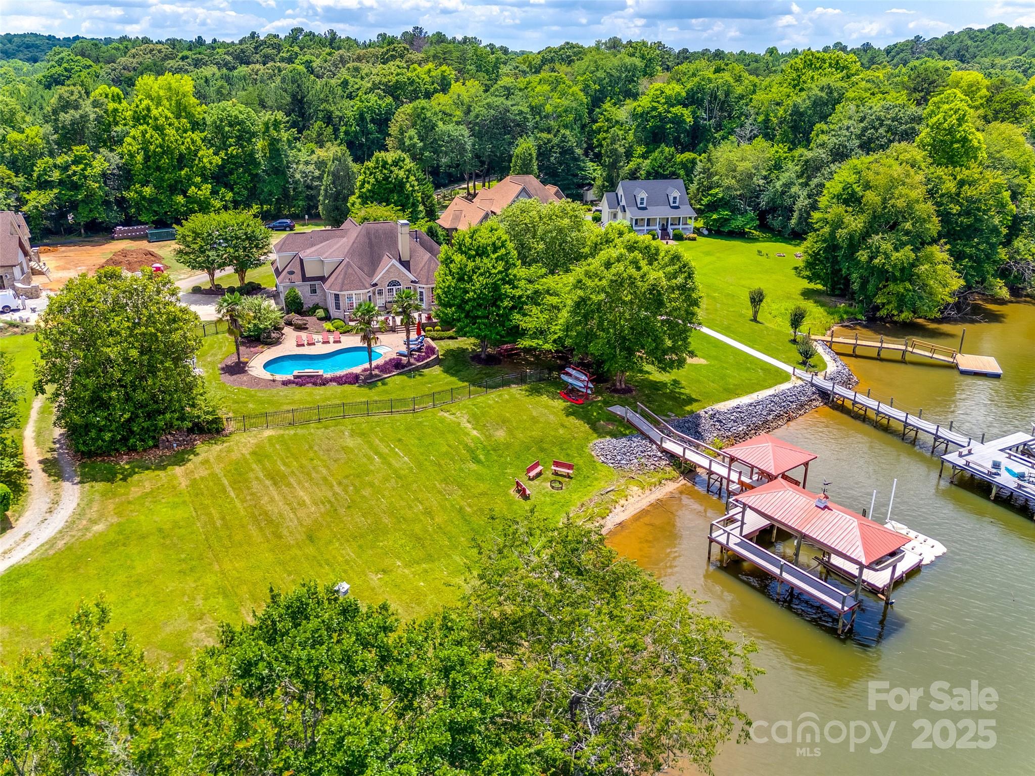 1765 Old Clay Hill Road York, SC 29745 - Photo 43 of 47 an aerial view of a swimming pool patio and mountain view