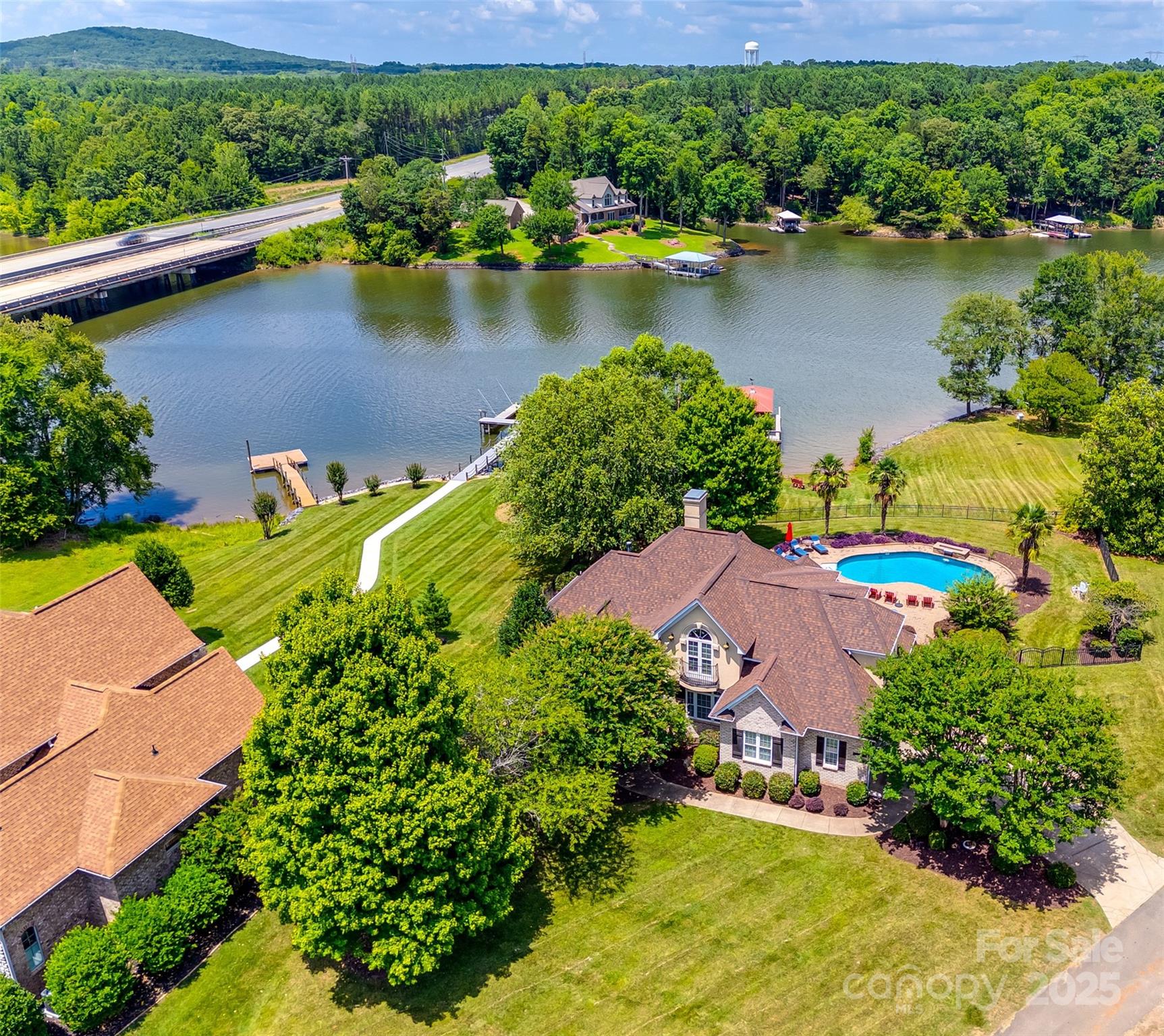 1765 Old Clay Hill Road York, SC 29745 - Photo 45 of 47 an aerial view of residential houses with outdoor space and lake view
