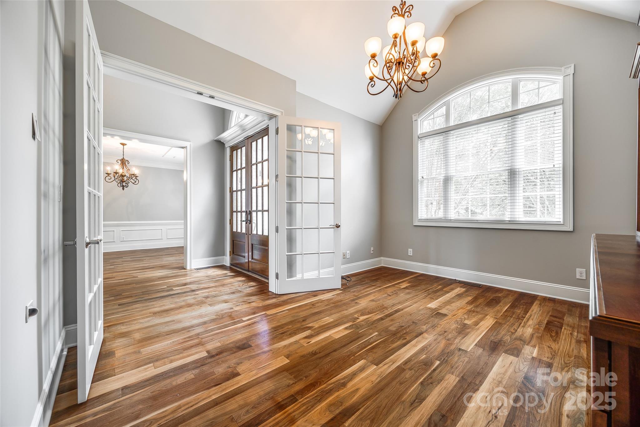 1765 Old Clay Hill Road York, SC 29745 - Photo 10 of 47 a view of an empty room with wooden floor and a window