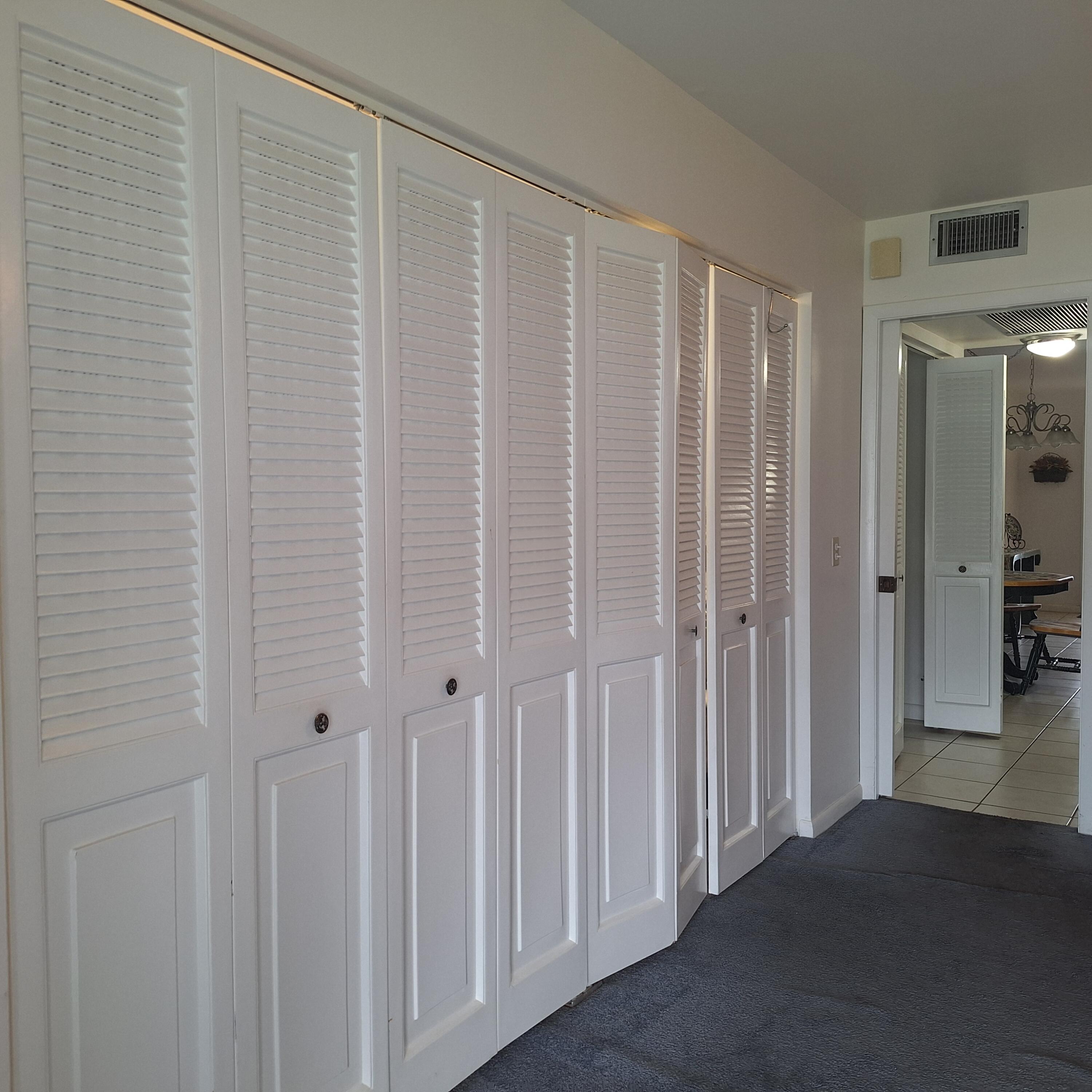 1010 Wolverton East Boca Raton, FL 33434 - Photo 4 of 30 a view of a room with a wooden door