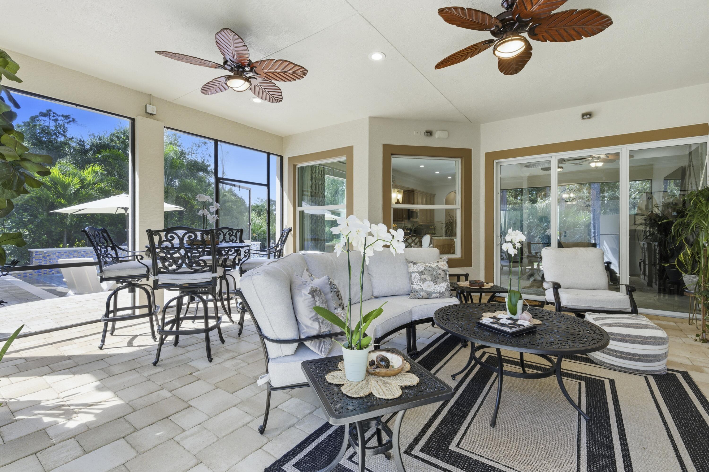 1016 Southwest Triste Way Stuart, FL 34997 - Photo 28 of 41 a view of a dining room with furniture window and outside view