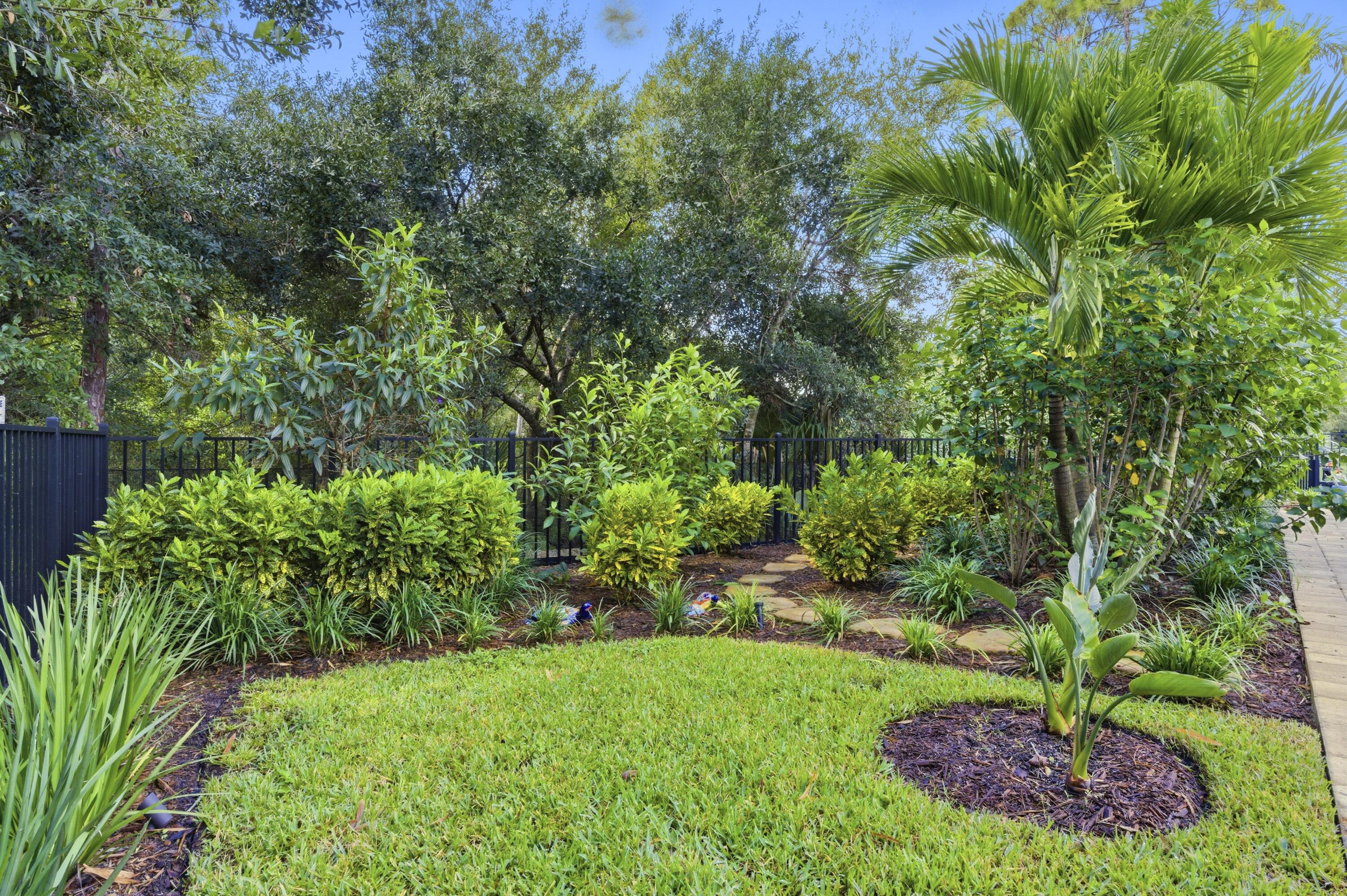 1016 Southwest Triste Way Stuart, FL 34997 - Photo 33 of 41 a view of yard with green space