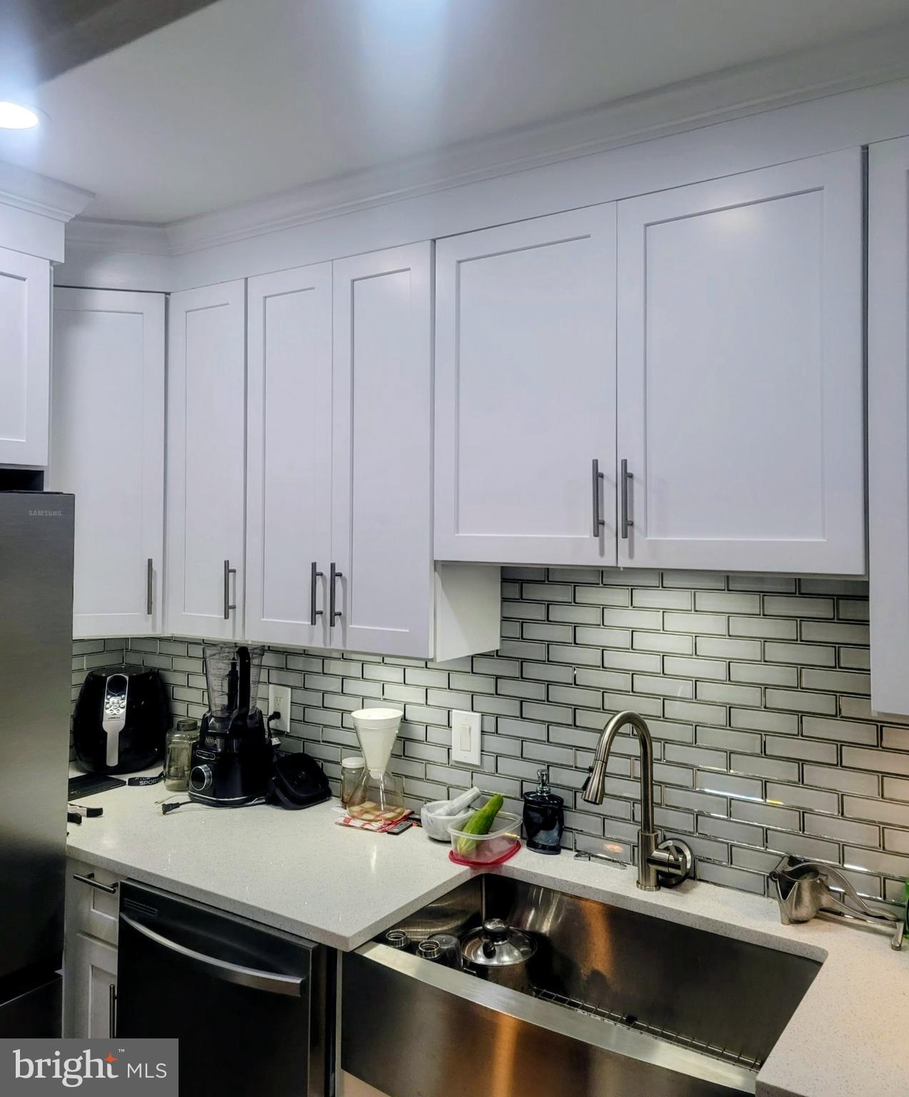6138 Wayne Avenue, Unit 2 Philadelphia, PA 19144 - Photo 2 of 22 a kitchen with a sink and cabinets