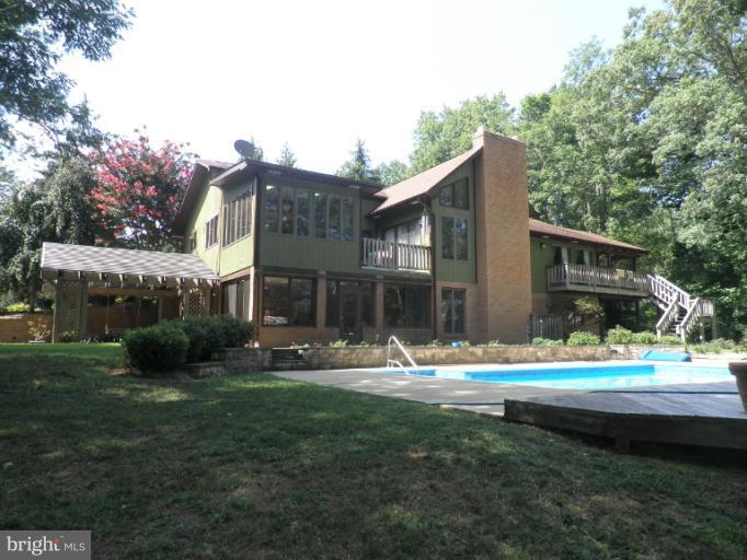 9880 McQueen Road Lusby, MD 20657 - Photo 1 of 30 Exterior (Rear)