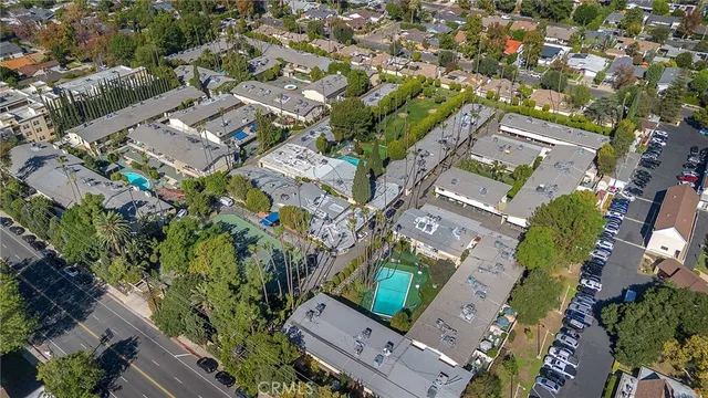 an aerial view of a city with lots of residential buildings