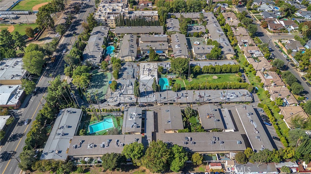 14243 Magnolia Boulevard Sherman Oaks, CA 91423 - Photo 7 of 8 an aerial view of multiple houses with yard