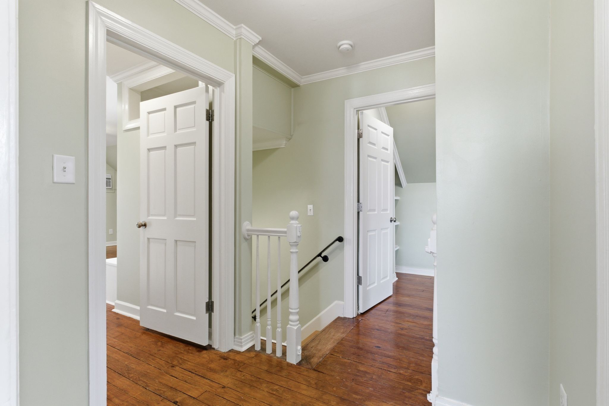 1002 Sutton Hill Road Nashville, TN 37204 - Photo 15 of 34 a view of a hallway with an entryway and wooden floor