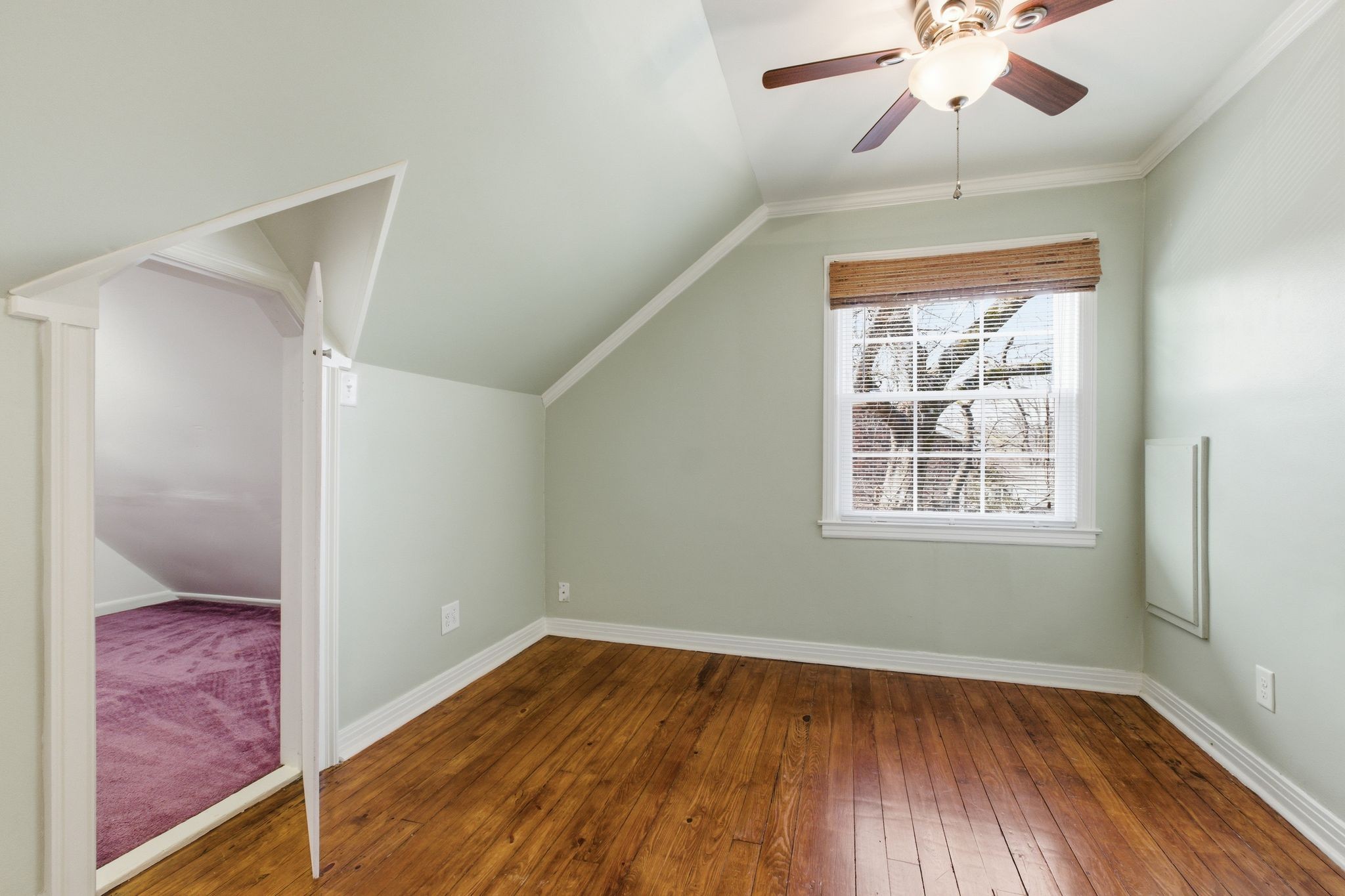 1002 Sutton Hill Road Nashville, TN 37204 - Photo 24 of 34 wooden floor in an empty room with a window