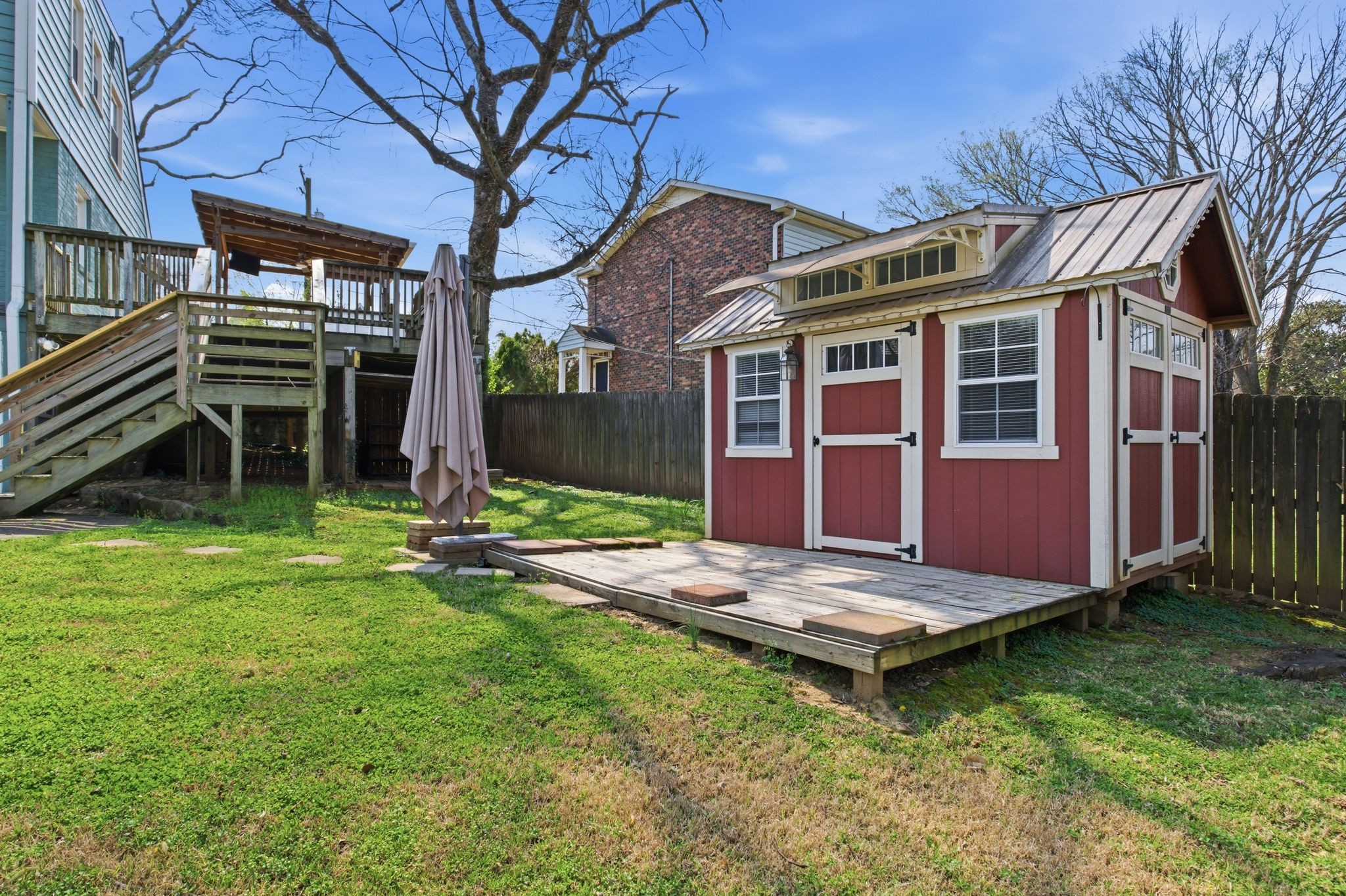 1002 Sutton Hill Road Nashville, TN 37204 - Photo 32 of 34 a view of a house with backyard