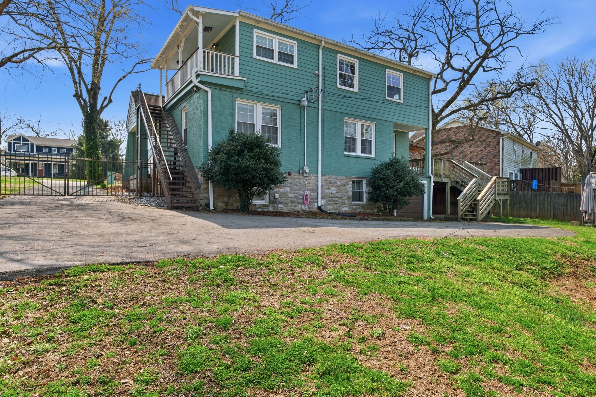 1002 Sutton Hill Road Nashville, TN 37204 - Photo 34 of 34 a front view of a house with a yard