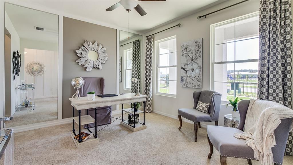 1909 Cobb Trail Parrish, FL 34219 - Photo 2 of 15 a view of a livingroom with furniture and a window