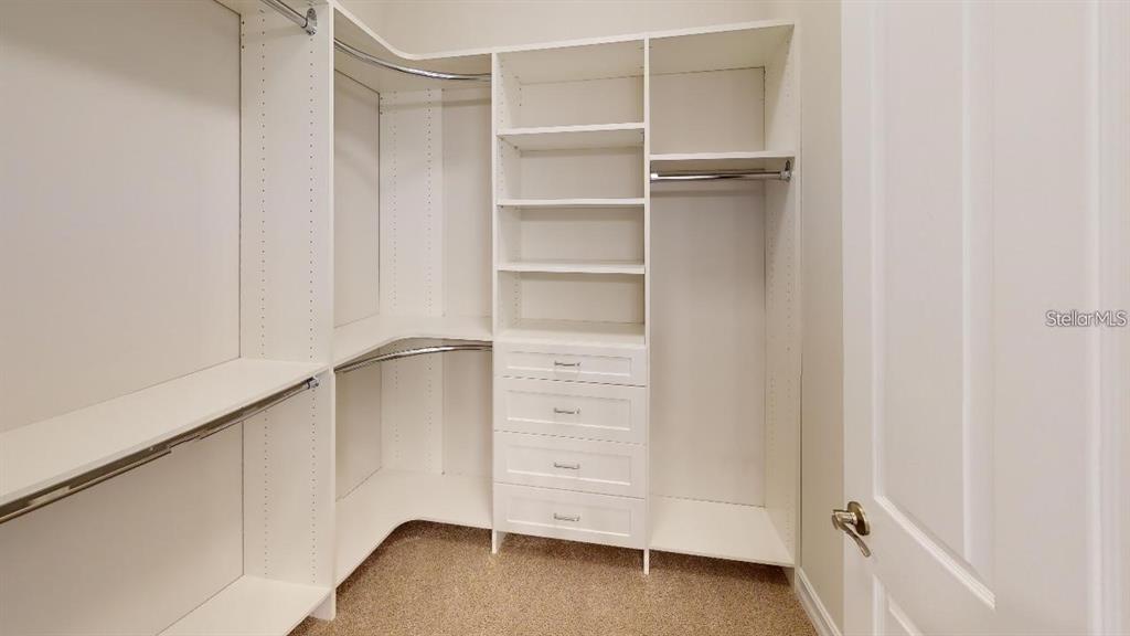 127 Ibiza Loop Venice, FL 34292 - Photo 12 of 20 a view of an empty walk in closet