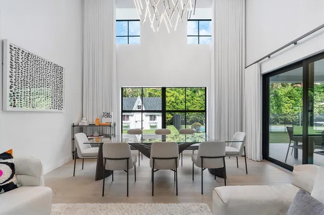 a kitchen with a stove cabinets and window