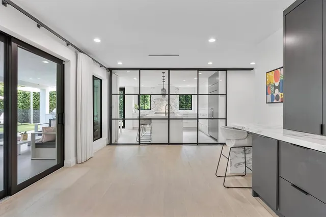 a bedroom with a bed and a couch