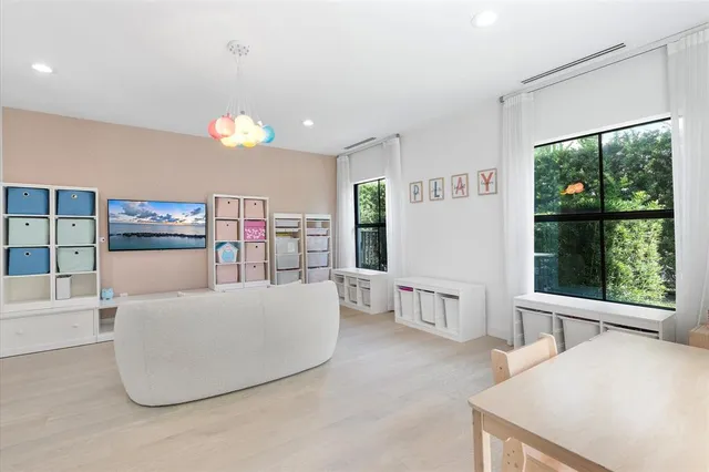 a bedroom with a bed and walk in closet