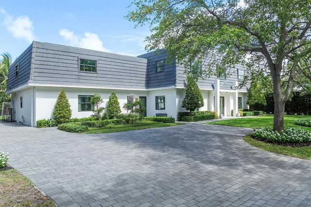 a view of a house with a garden