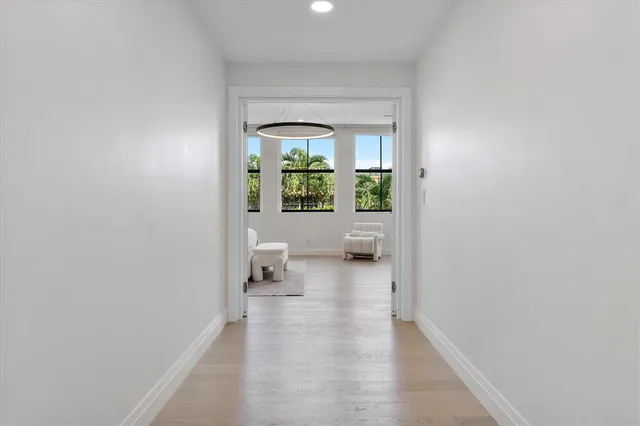 a view of a backyard with swimming pool