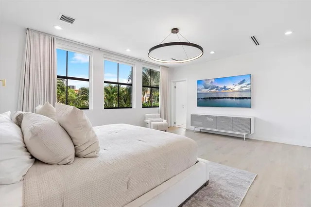 a view of a brick building next to a yard