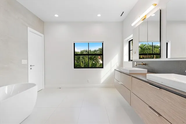 a front view of building with yard and green space